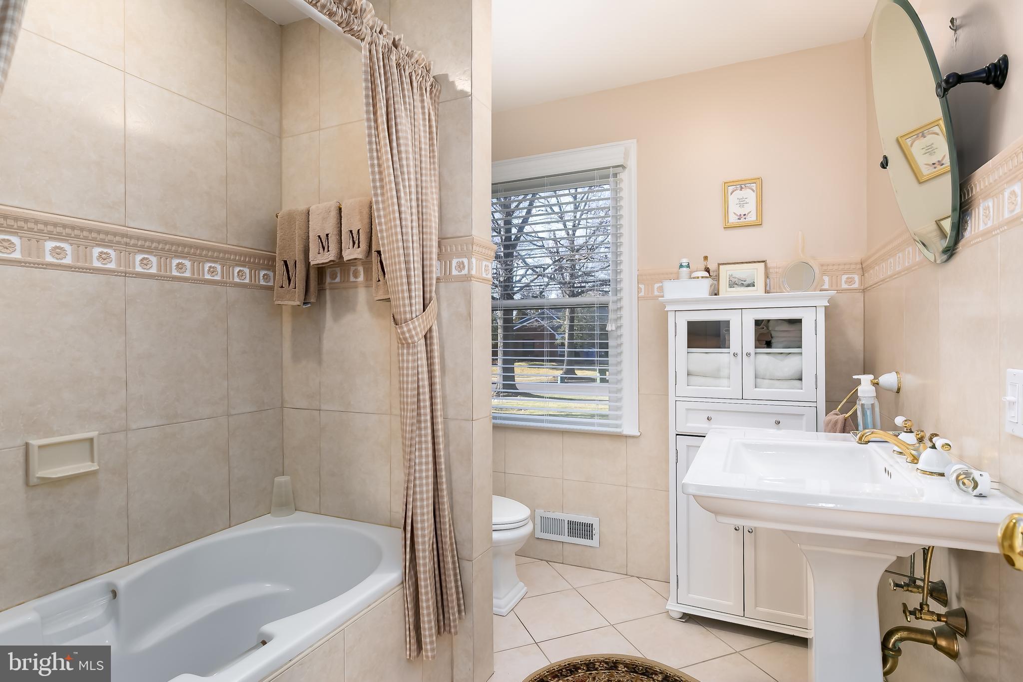 1201 Fulwood Road Cherry Hill, NJ 08034 - Photo 13 of 24 hall bath-tub has a ceramic surround