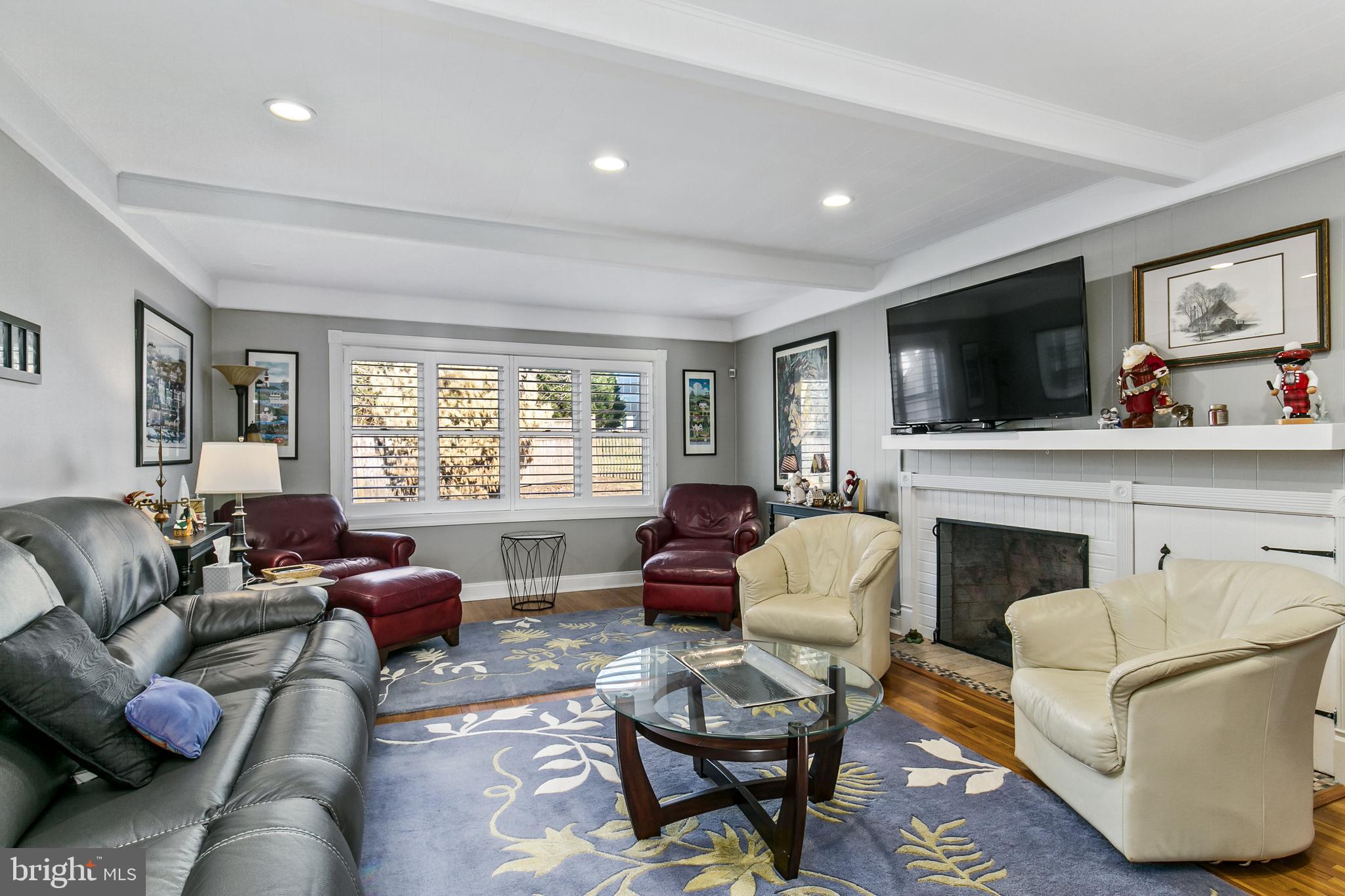 1201 Fulwood Road Cherry Hill, NJ 08034 - Photo 3 of 24 living room with gas fireplace and recessed lights