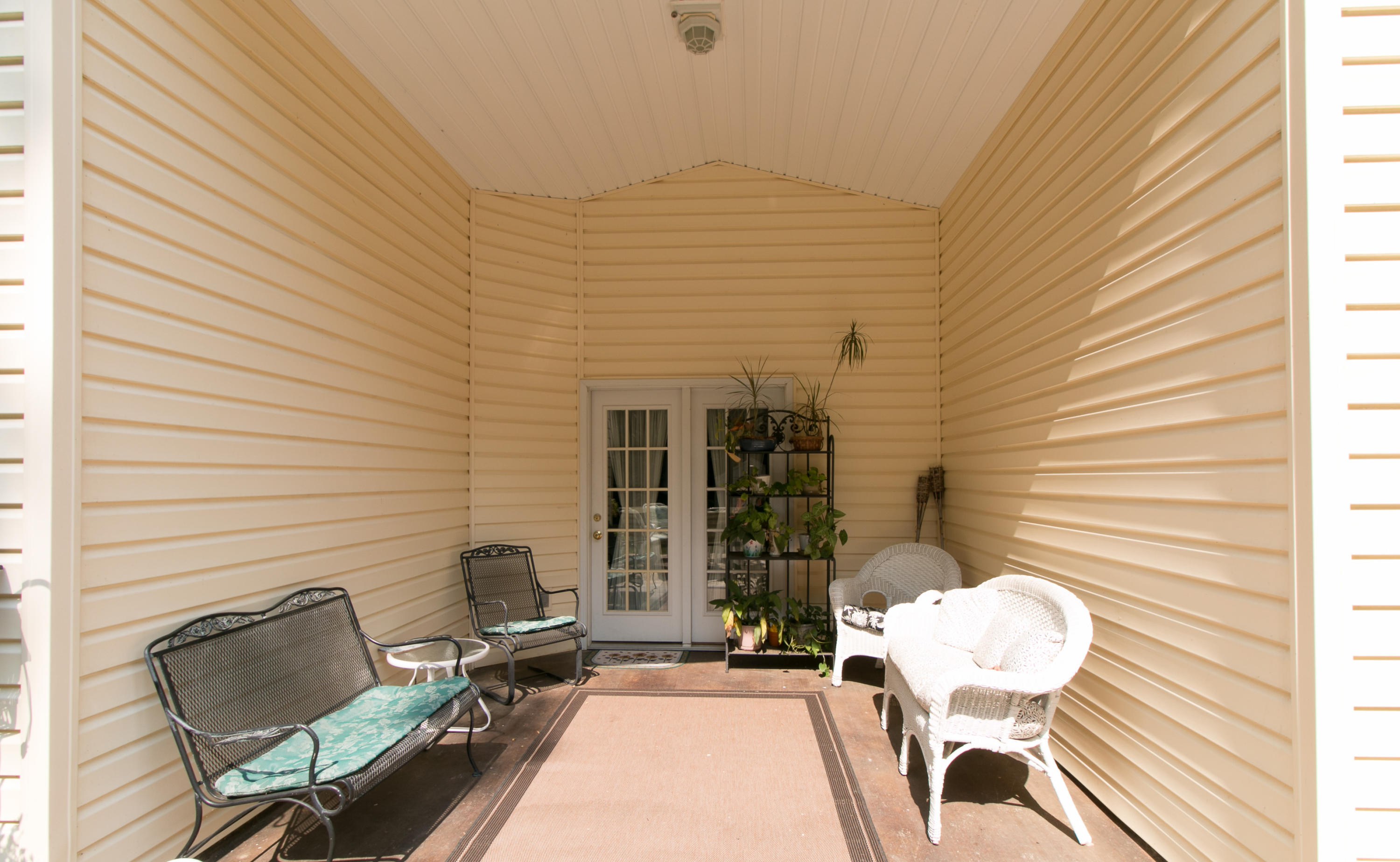 4228 Daugherty Road Salem, VA 24153 - Photo 22 of 24 a brick house with chairs in front of it