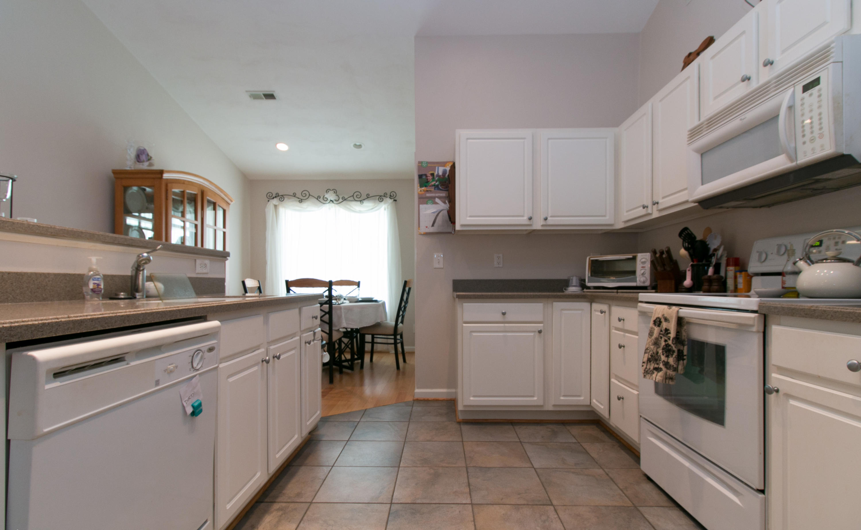 4228 Daugherty Road Salem, VA 24153 - Photo 8 of 24 a kitchen with cabinets appliances and a sink