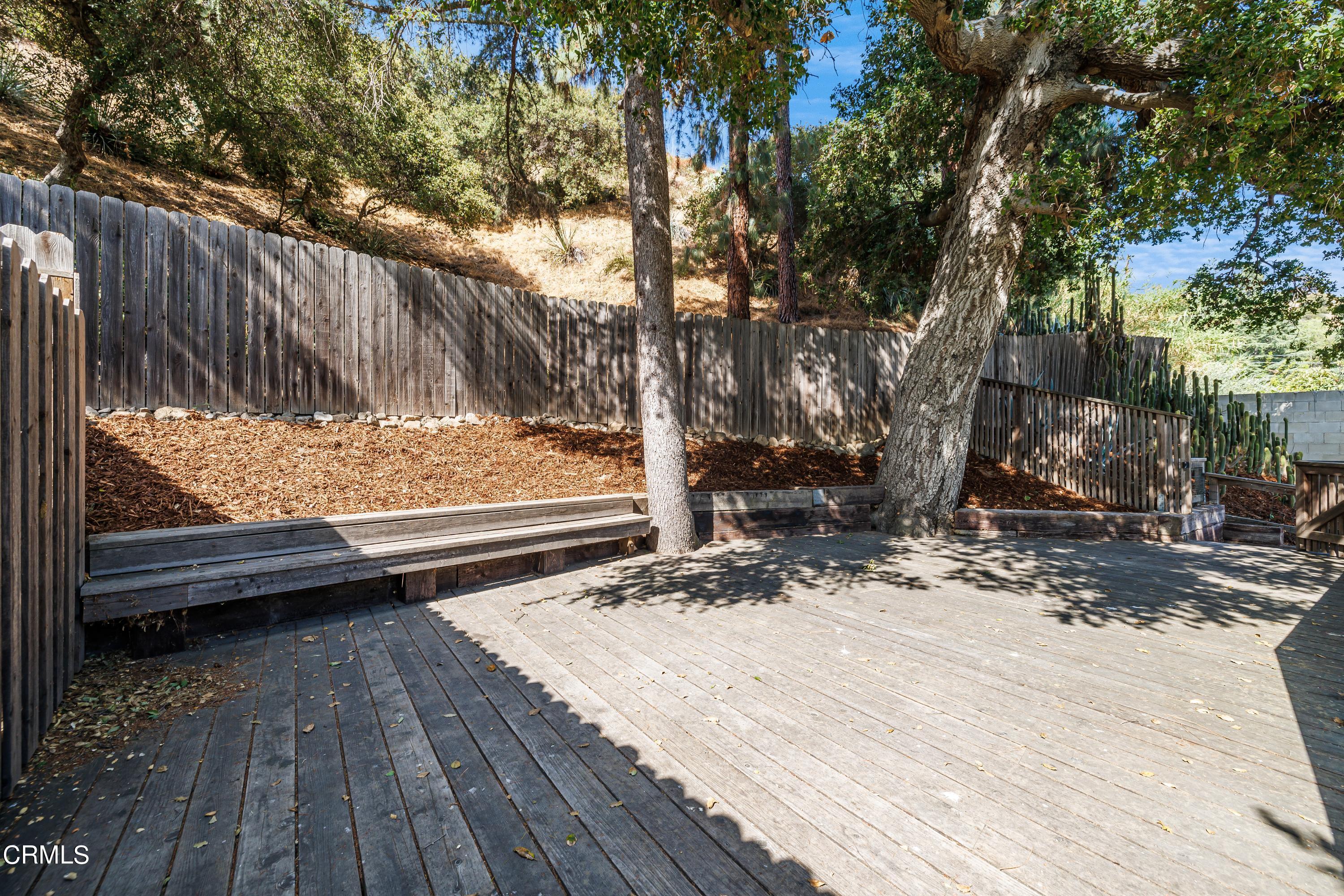 6463 Tokay Road Tujunga, CA 91042 - Photo 22 of 23 a view of a wooden deck and a yard view