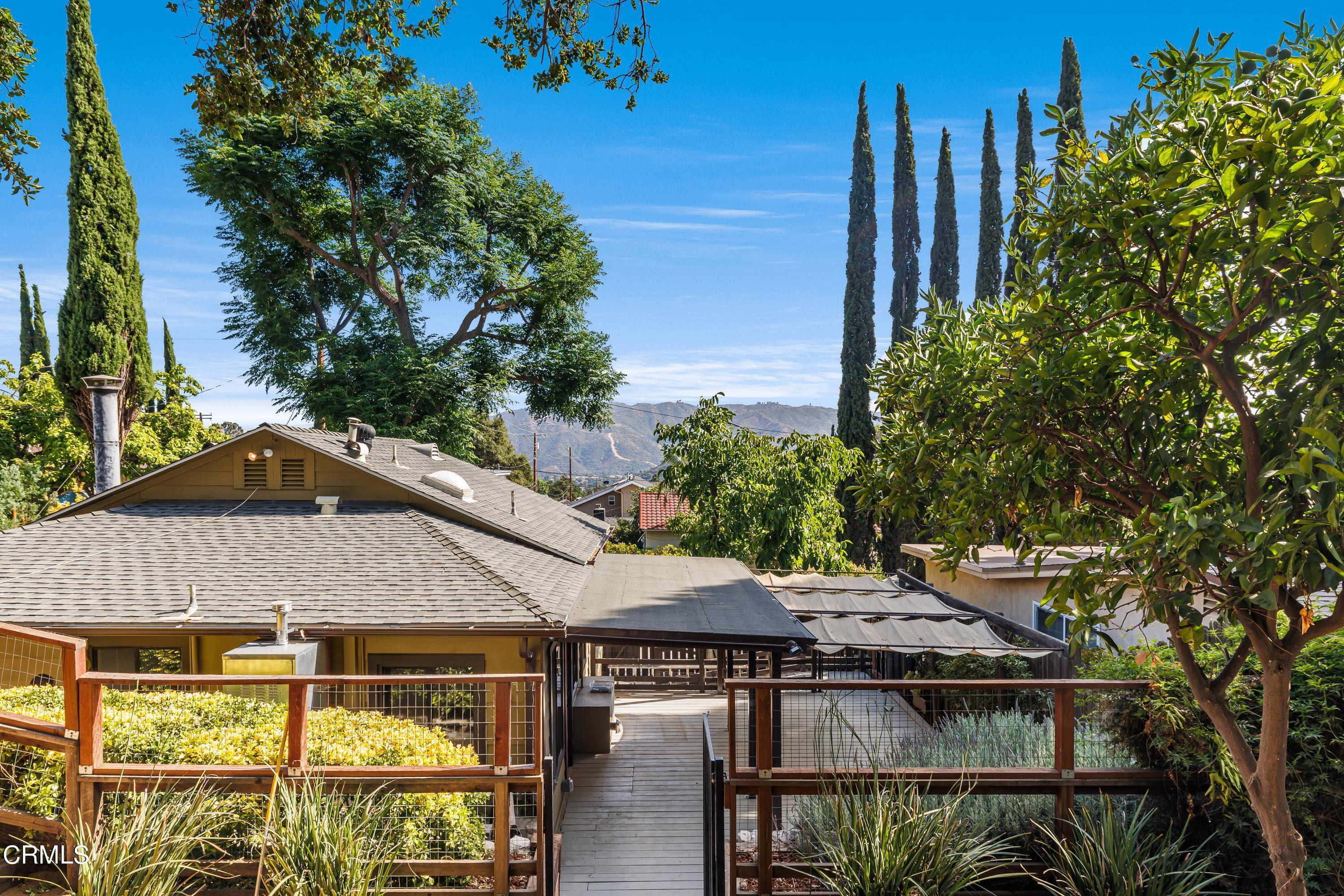 6463 Tokay Road Tujunga, CA 91042 - Photo 23 of 23 a front view of house with yard and trees in the background