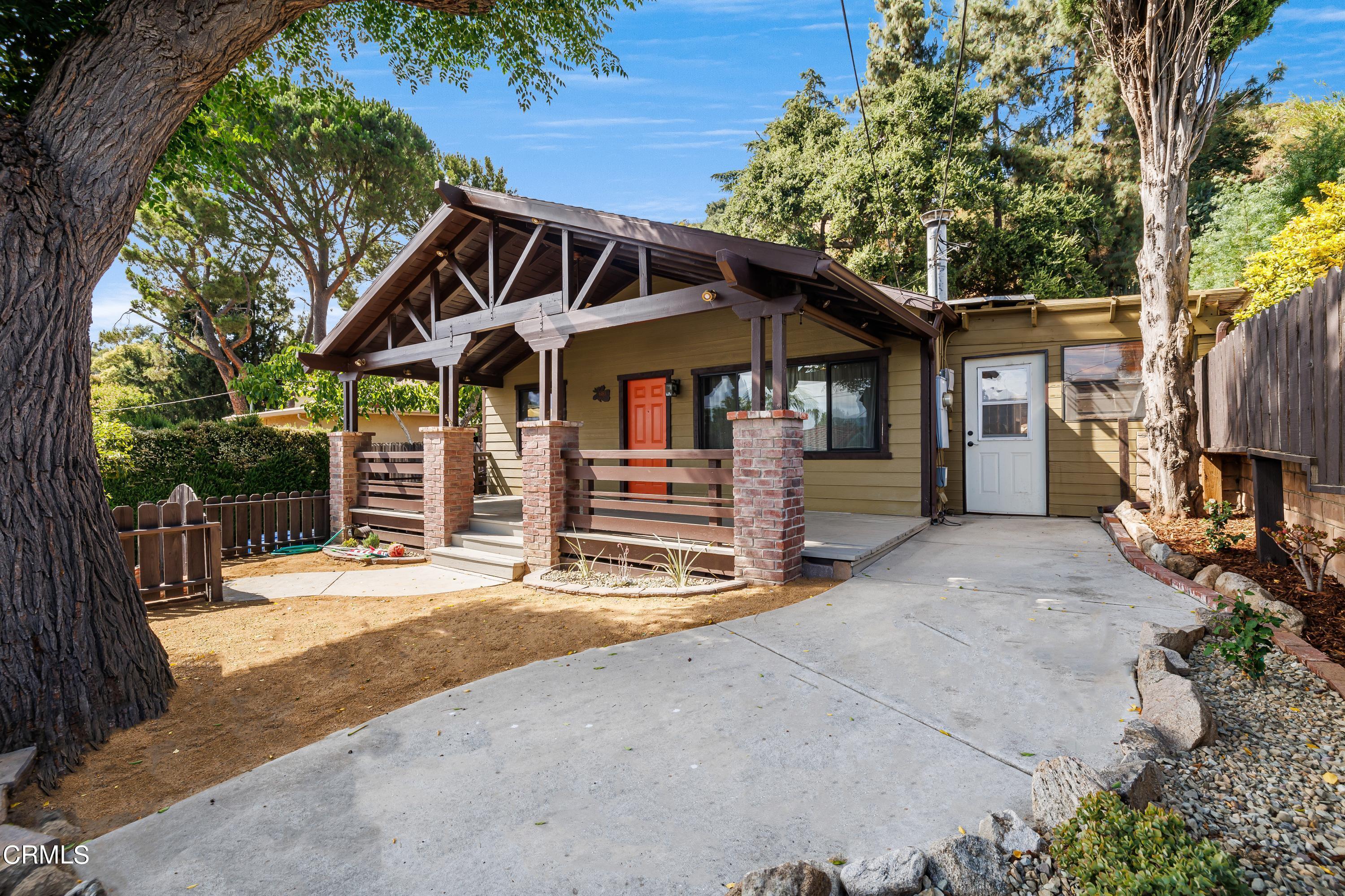 6463 Tokay Road Tujunga, CA 91042 - Photo 3 of 23 a front view of a house with a garage