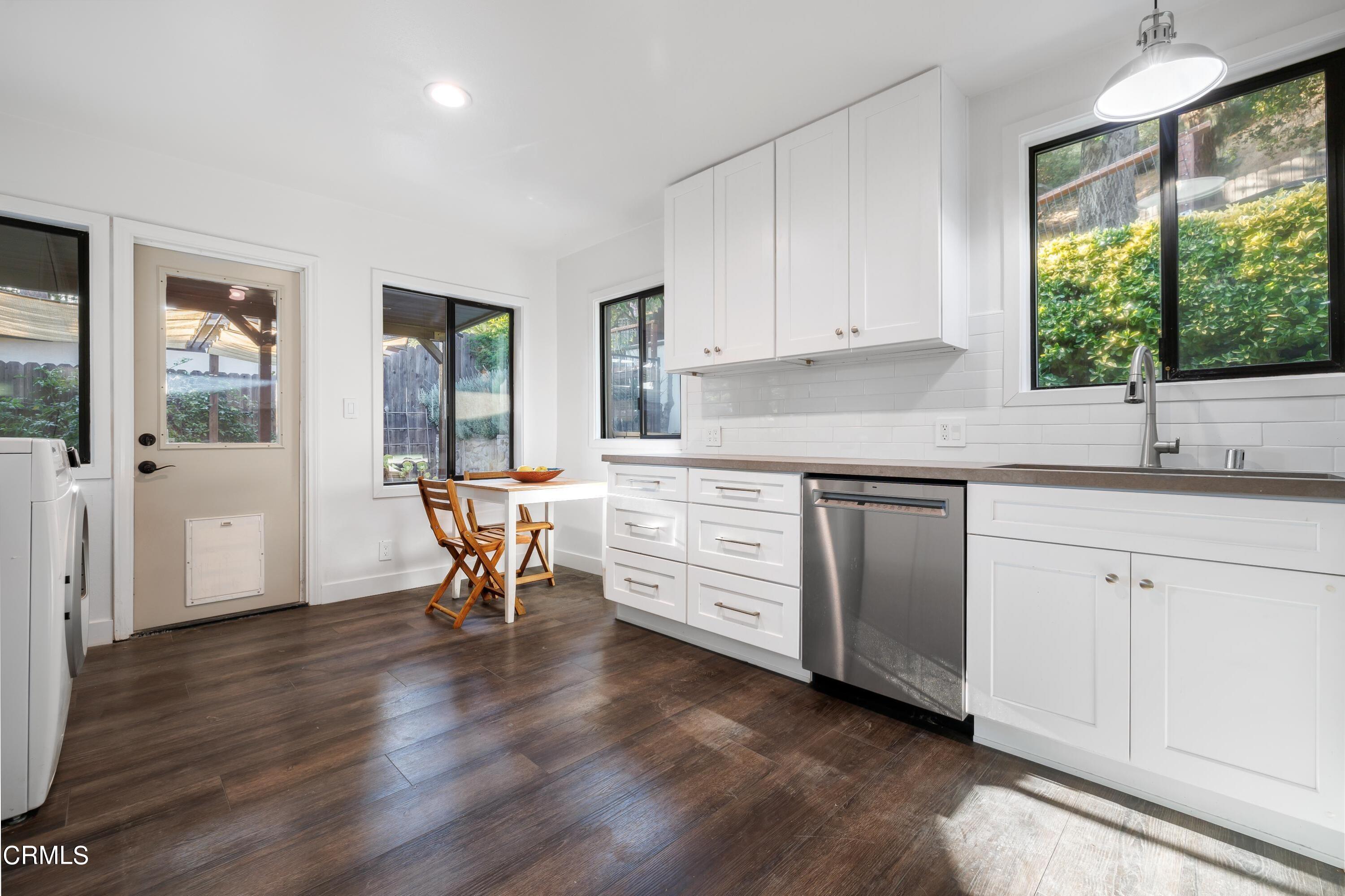 6463 Tokay Road Tujunga, CA 91042 - Photo 10 of 23 a kitchen that has a cabinets counter space and a window