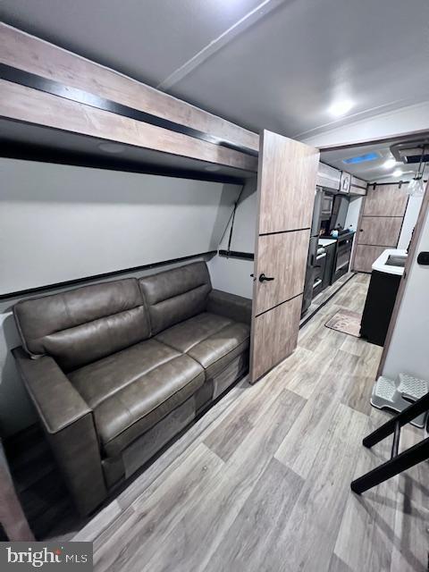 669 Highway 9, Unit 458 Cape May, NJ 08204 - Photo 6 of 21 a living room with a couch and a coffee table