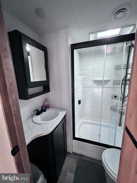 669 Highway 9, Unit 458 Cape May, NJ 08204 - Photo 10 of 21 a bathroom with a sink and a mirror