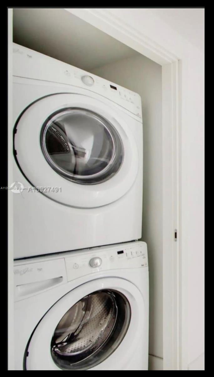 Brickell Miami, FL 33130 - Photo 20 of 30 a utility room with dryer and washer