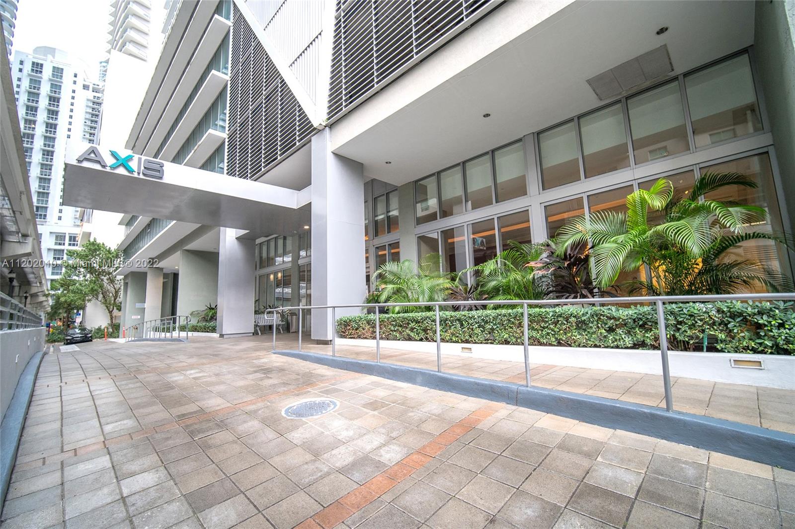 Brickell Miami, FL 33130 - Photo 30 of 30 a view of a building with a window and potted plants