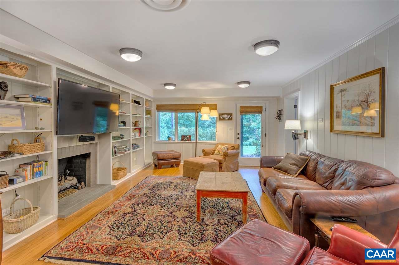 2015 Spottswood Road Charlottesville, VA 22903 - Photo 26 of 41 Renovated terrace level family room with built in shelves and gas fireplace