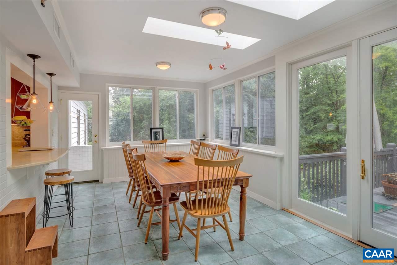 2015 Spottswood Road Charlottesville, VA 22903 - Photo 10 of 41 The kitchen opens to a large great room with a wall of windows and beautiful tile floors