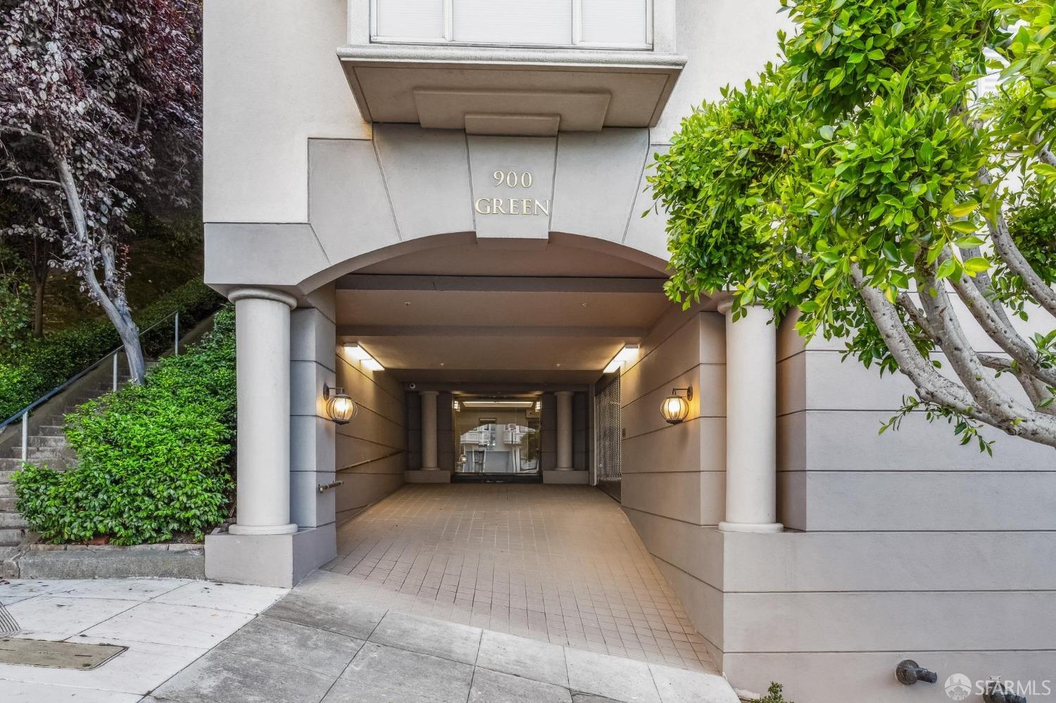 900 Green Street, Unit 600 San Francisco, CA 94133 - Photo 13 of 50 a view of a house with a large window and potted plants