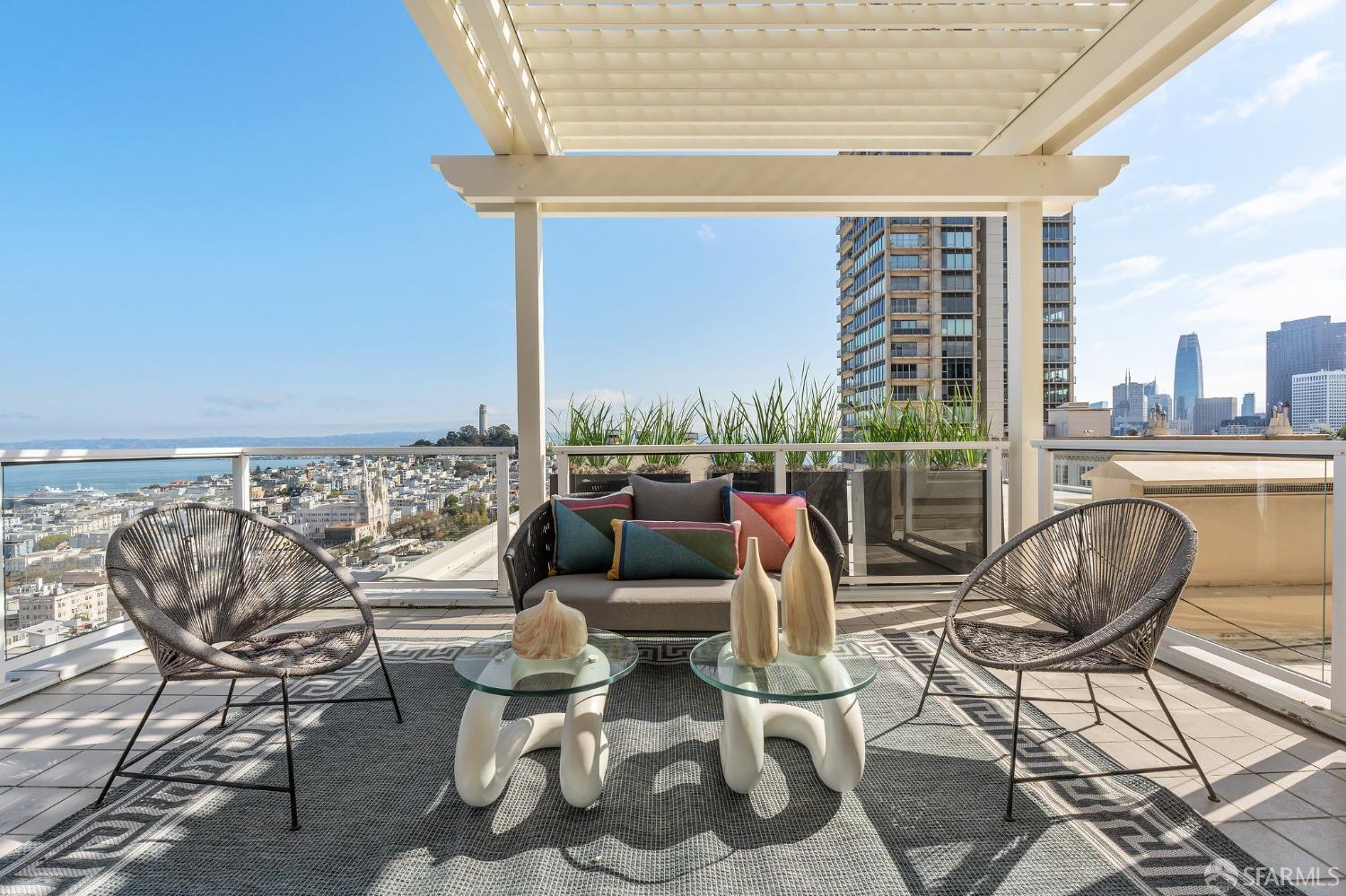 900 Green Street, Unit 600 San Francisco, CA 94133 - Photo 26 of 50 a living room with furniture and a floor to ceiling window