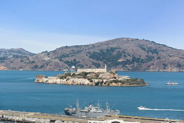a view of a lake with a mountain
