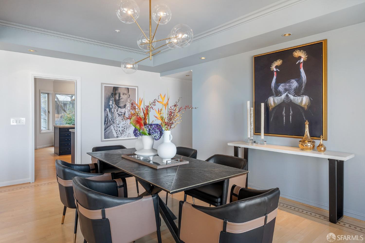 900 Green Street, Unit 600 San Francisco, CA 94133 - Photo 31 of 50 a view of a dining room with furniture and wooden floor