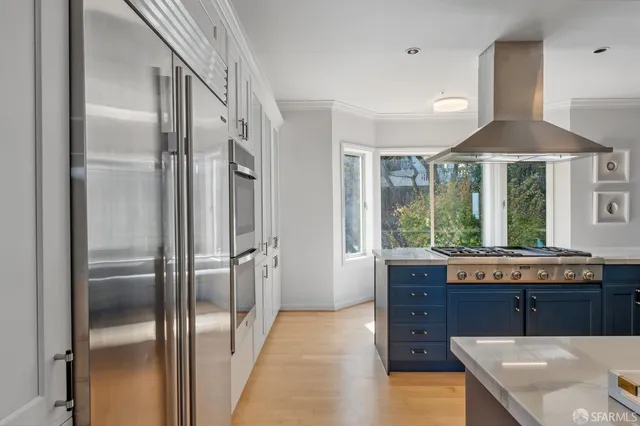 a dining table chair next to a window