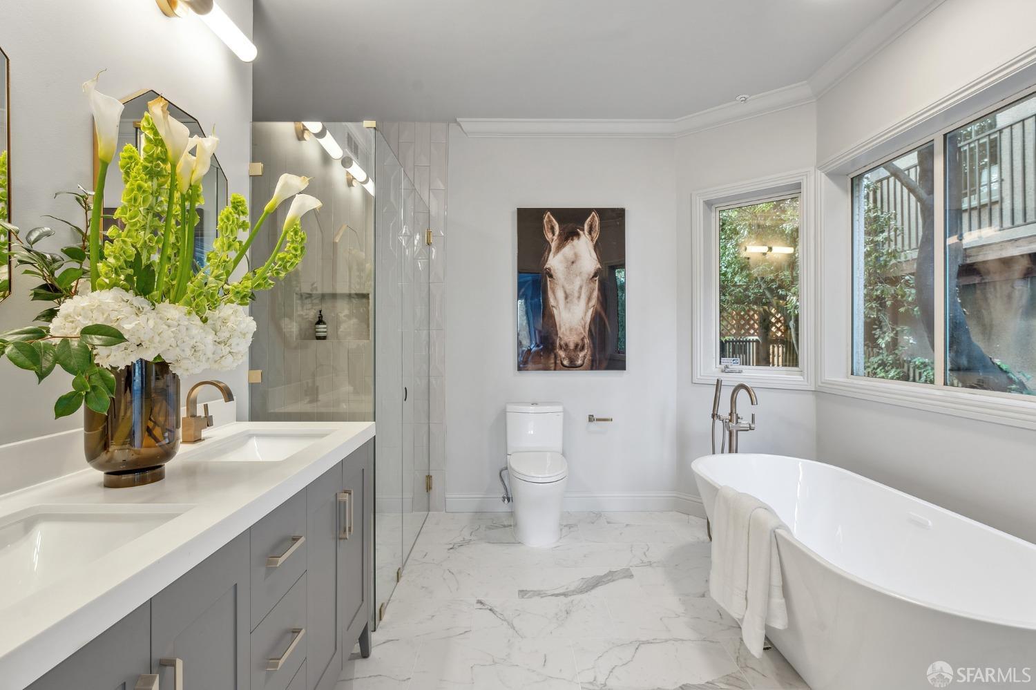 900 Green Street, Unit 600 San Francisco, CA 94133 - Photo 39 of 50 a bathroom with a sink a toilet and a bathtub