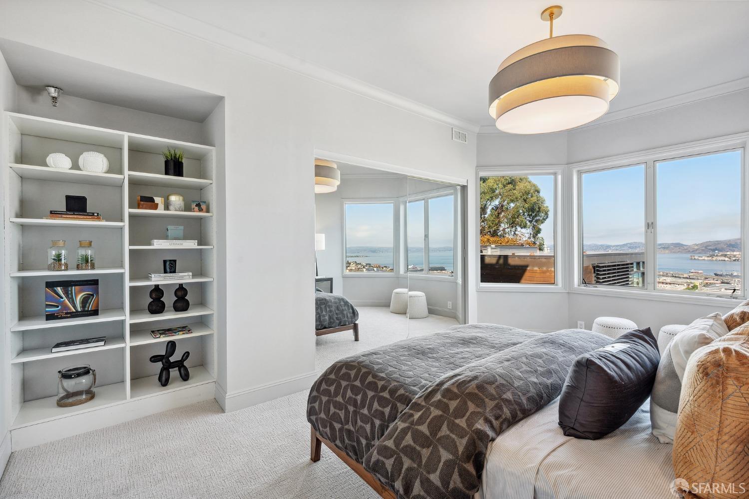 900 Green Street, Unit 600 San Francisco, CA 94133 - Photo 43 of 50 a bedroom with a large bed and a window