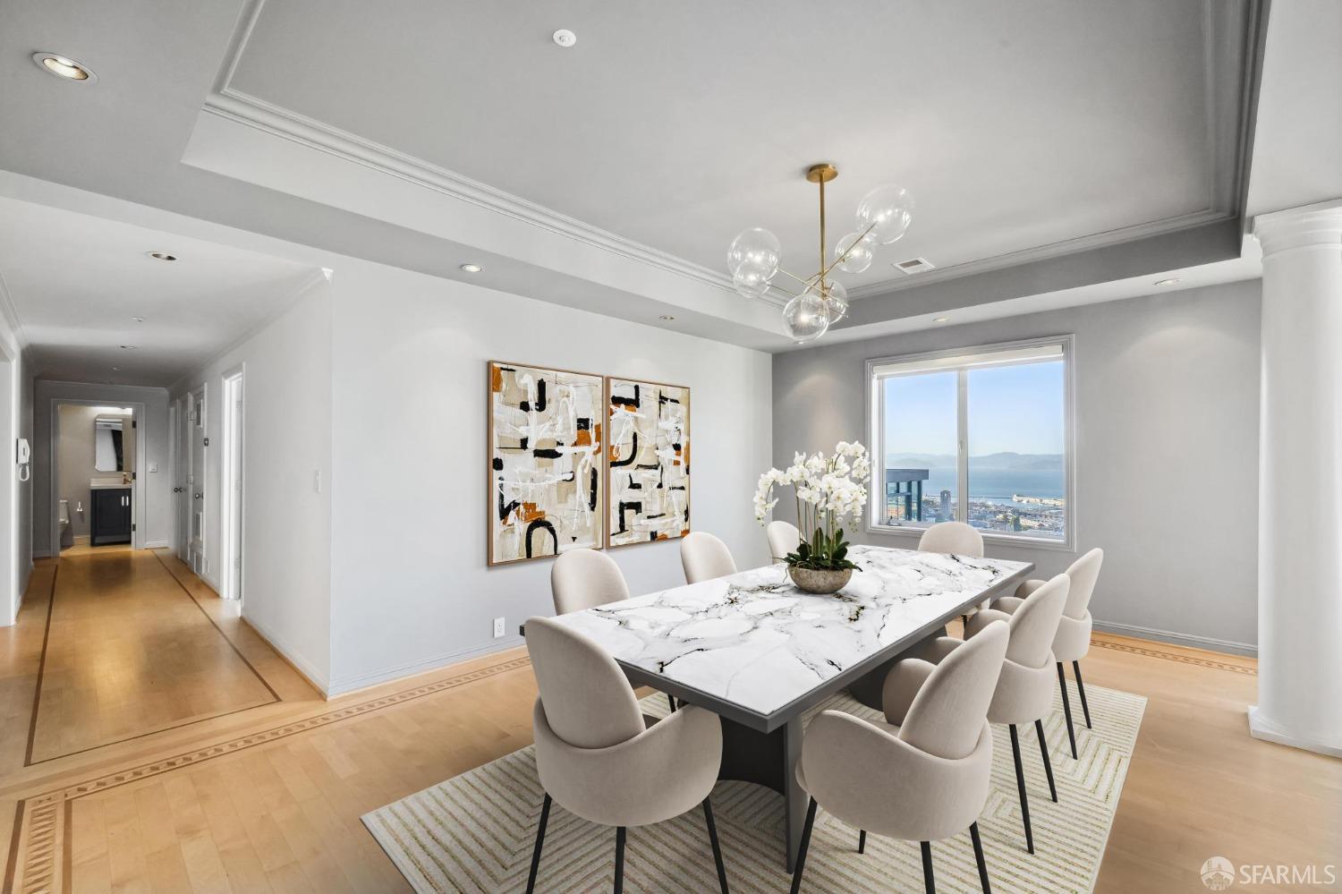 900 Green Street, Unit 600 San Francisco, CA 94133 - Photo 8 of 50 a view of a dining room with furniture and wooden floor