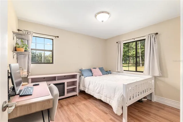 a workspace with furniture and window