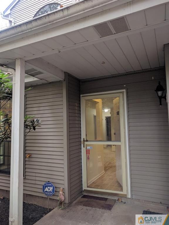 5001 Stonehedge Road, Unit 5001 Edison, NJ 08820 - Photo 7 of 13 a view of a door of the house