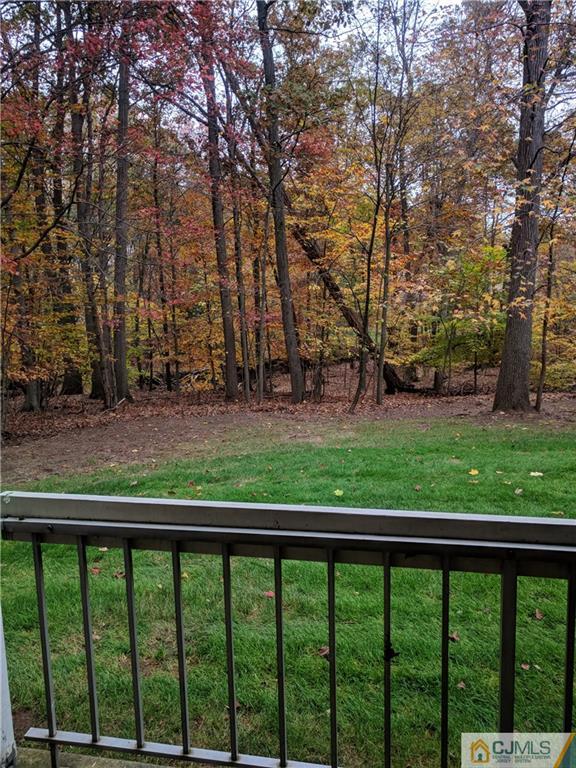 5001 Stonehedge Road, Unit 5001 Edison, NJ 08820 - Photo 9 of 13 a view of a yard from a balcony