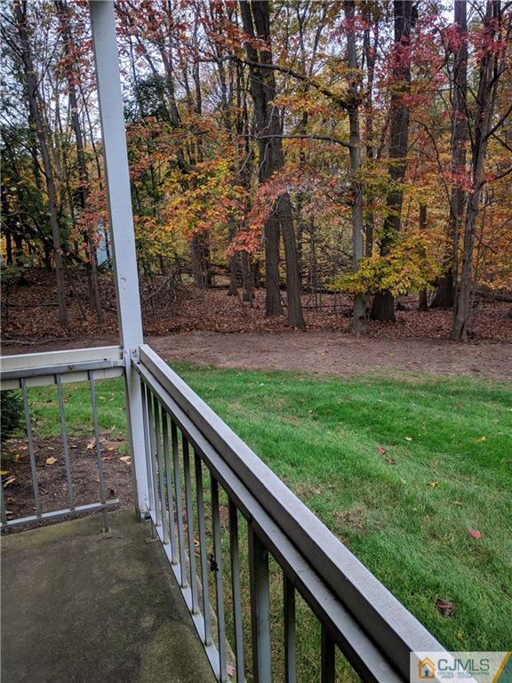5001 Stonehedge Road, Unit 5001 Edison, NJ 08820 - Photo 10 of 13 a view of backyard with green space