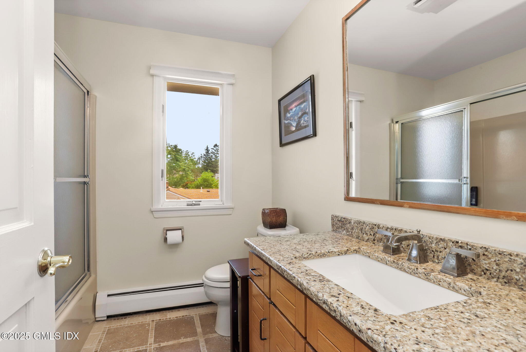 16 Elizabeth Lane Riverside, CT 06878 - Photo 25 of 38 a bathroom with a granite countertop sink and a mirror