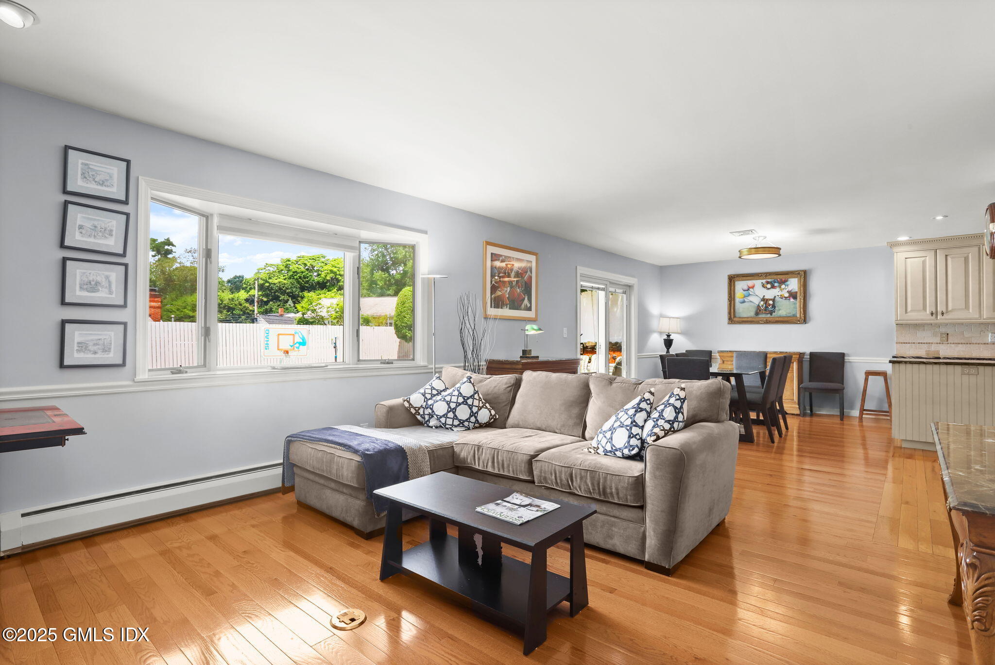 16 Elizabeth Lane Riverside, CT 06878 - Photo 6 of 38 a living room with furniture and a large window