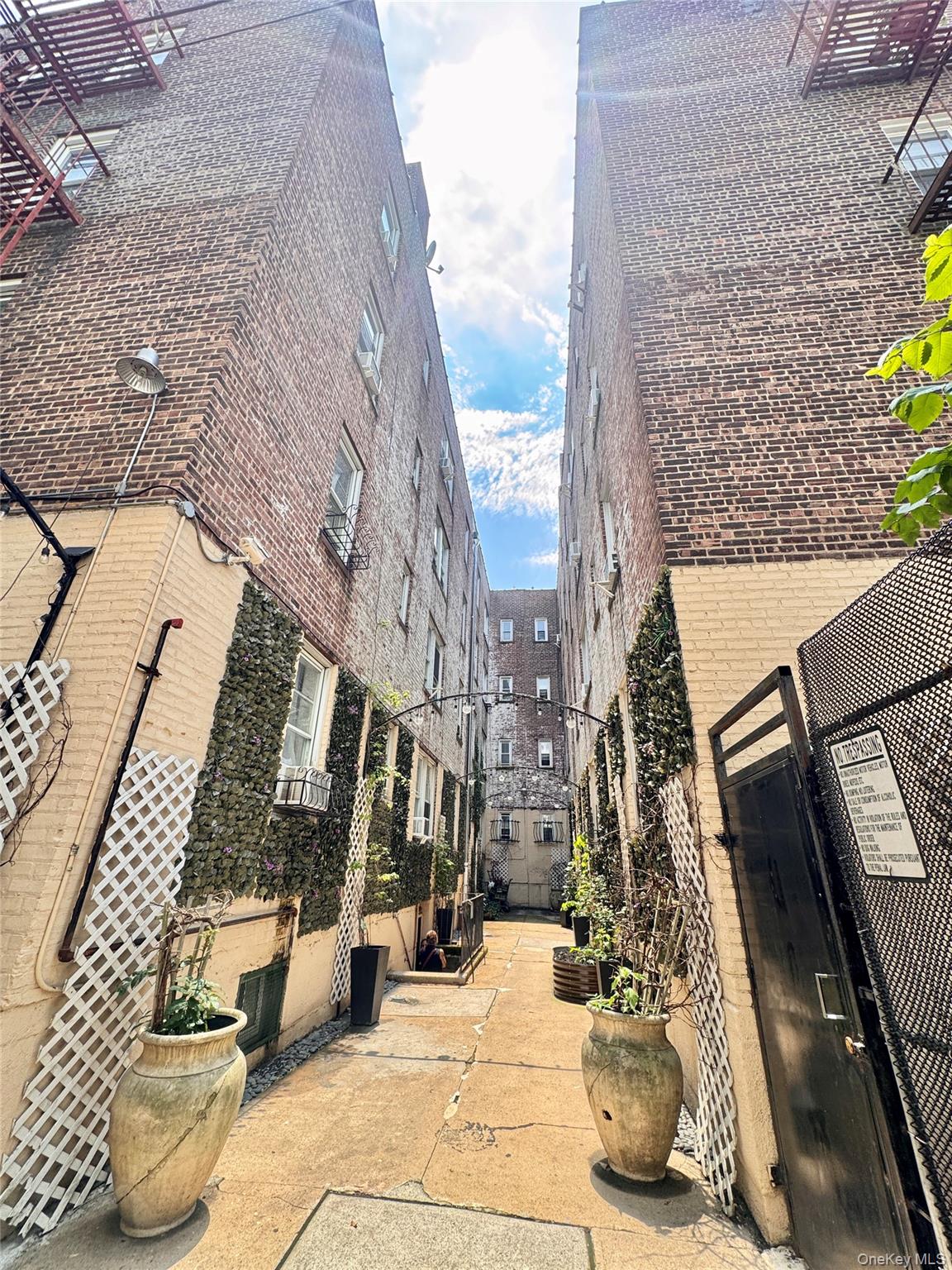 98-15 34th Avenue Queens, NY 11368 - Photo 30 of 41 a view of tall buildings