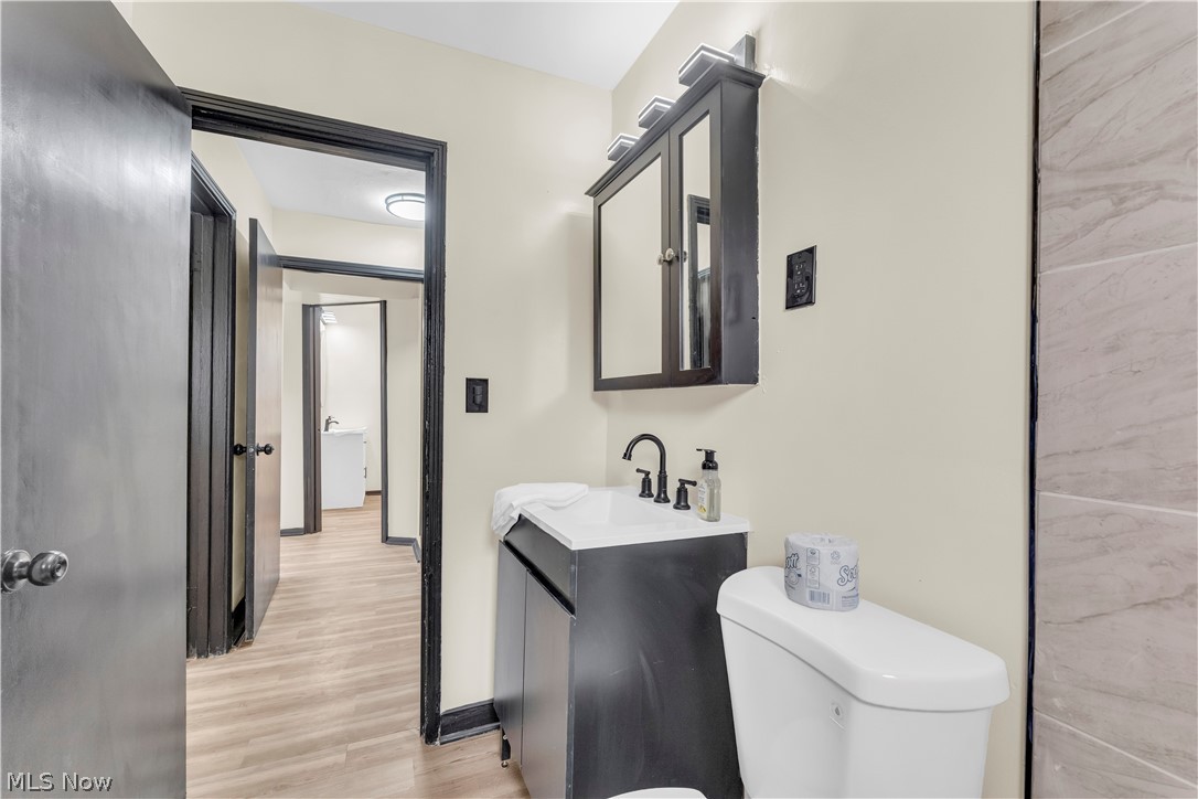 7320 Avon Belden Road North Ridgeville, OH 44039 - Photo 20 of 33 Bathroom with vanity and light wood-type flooring