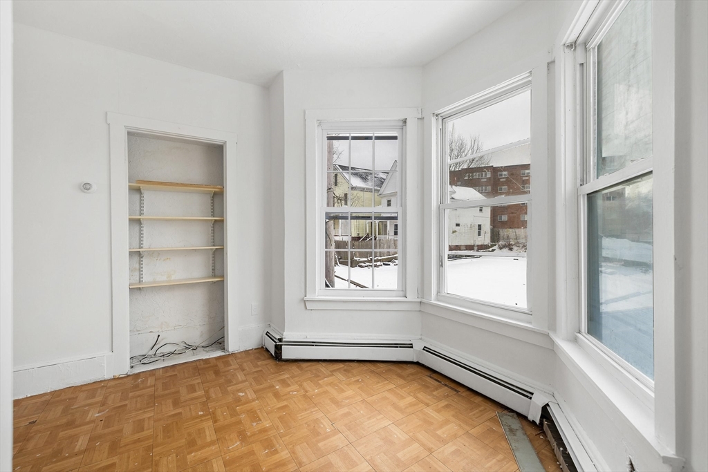 1 Ely Street Worcester, MA 01610 - Photo 15 of 25 a view of an empty room with a window
