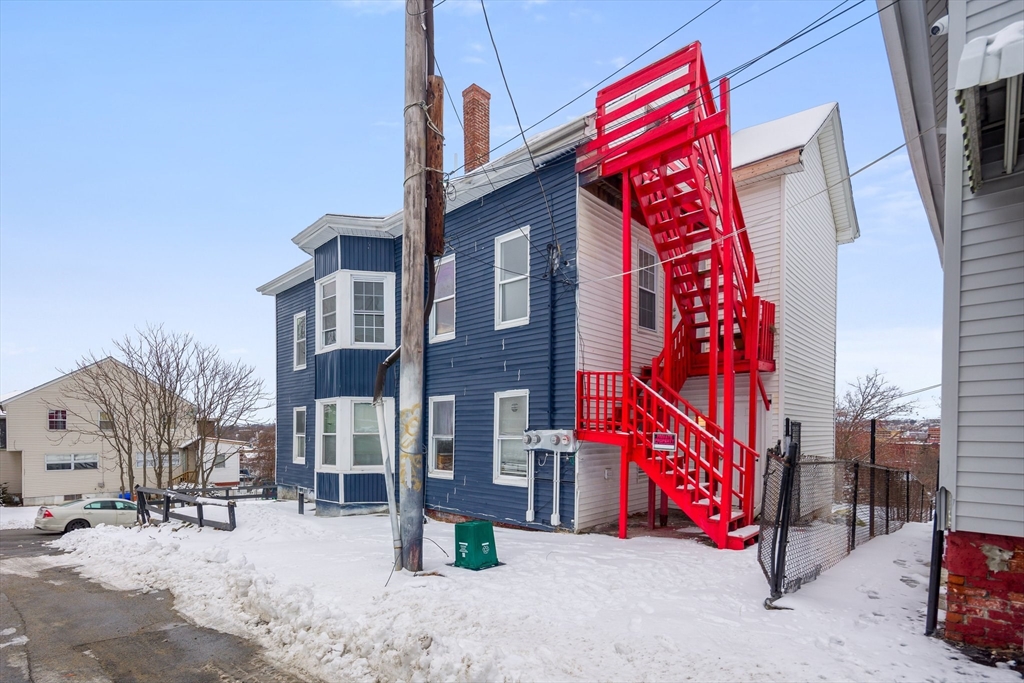 1 Ely Street Worcester, MA 01610 - Photo 3 of 25 a street sign on a street corner