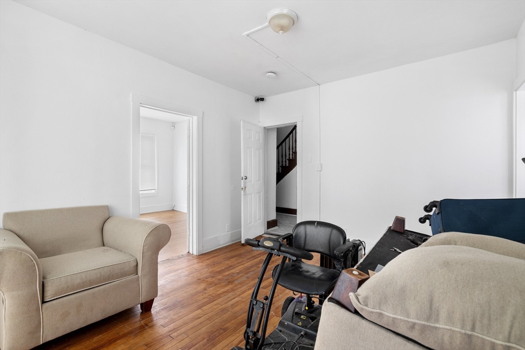 1 Ely Street Worcester, MA 01610 - Photo 10 of 25 a living room with furniture and a flat screen tv