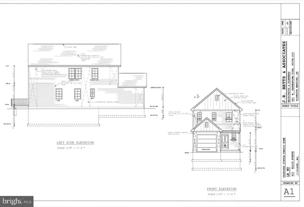 a black and white photo of a living room