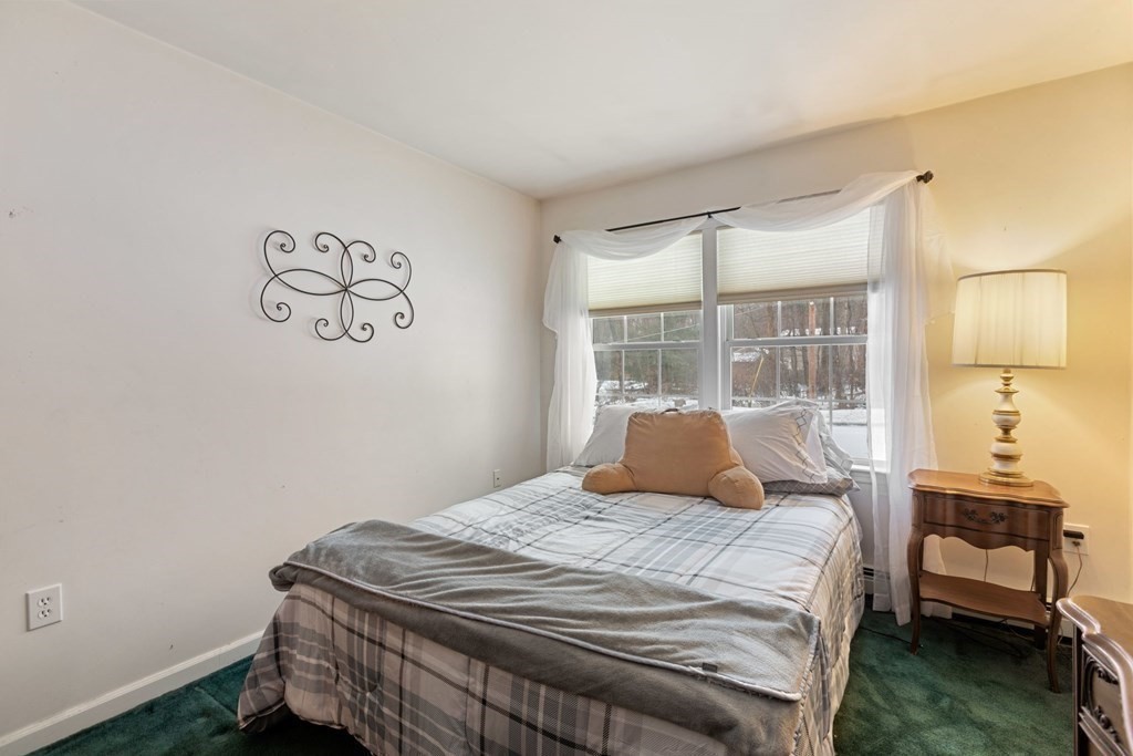 22 Oak Road Littleton, MA 01460 - Photo 12 of 42 a bedroom with a bed and a window