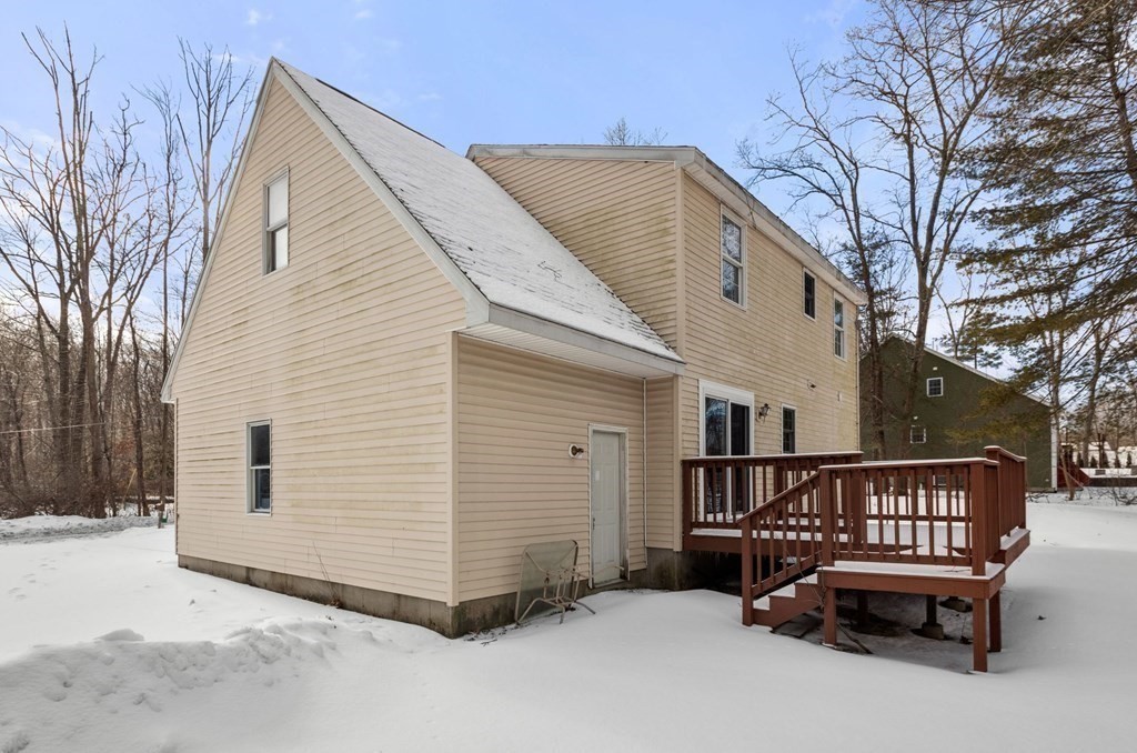 22 Oak Road Littleton, MA 01460 - Photo 26 of 42 a view of backyard with deck