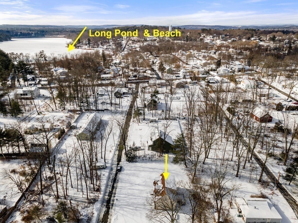 22 Oak Road Littleton, MA 01460 - Photo 35 of 42 a view of a swimming pool and an outdoor seating