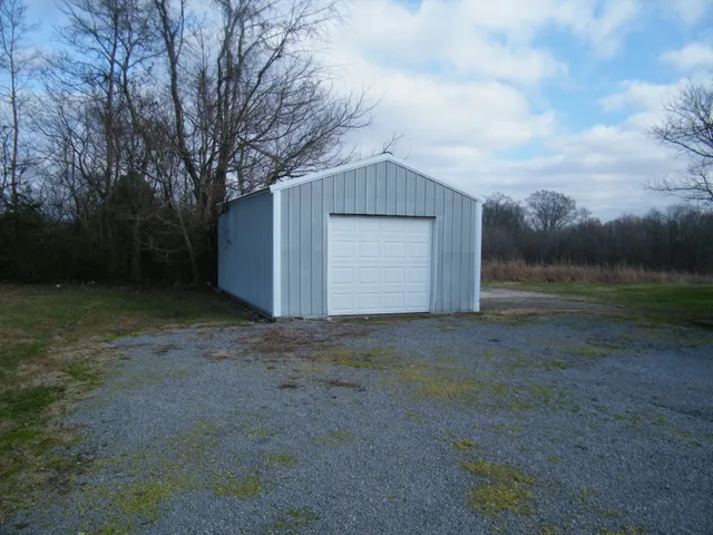 a view of backyard and entertaining space