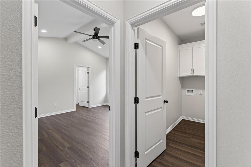 117 East Bexar Street Mabank, TX 75147 - Photo 17 of 27 a view of a hallway with wooden floor and closet area