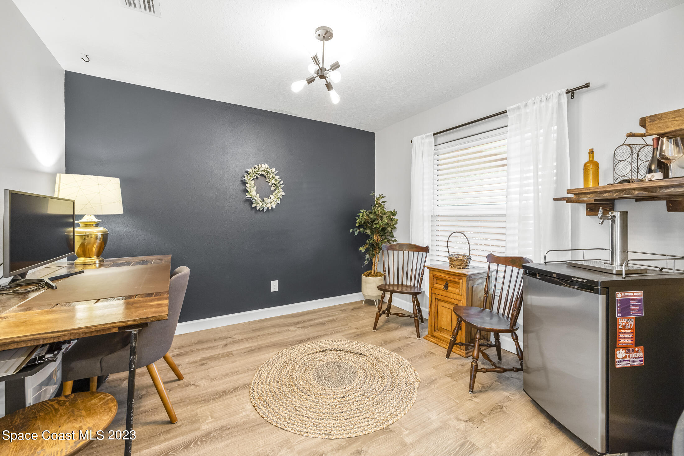 1003 Hayden Road Rockledge, FL 32955 - Photo 15 of 29 a workspace with furniture and window