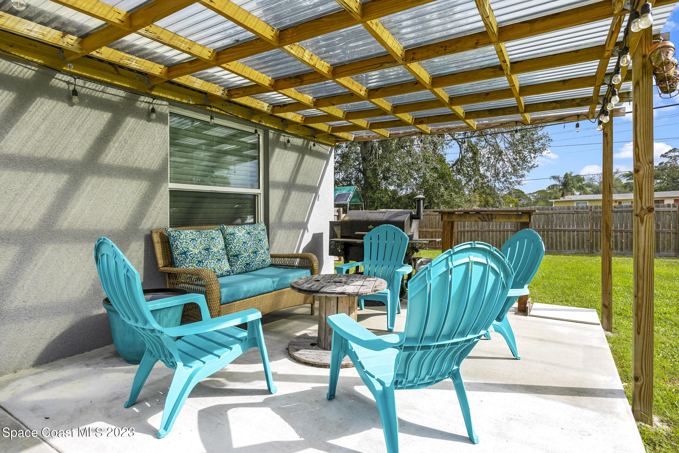 1003 Hayden Road Rockledge, FL 32955 - Photo 24 of 29 a view of an chairs and table in the patio
