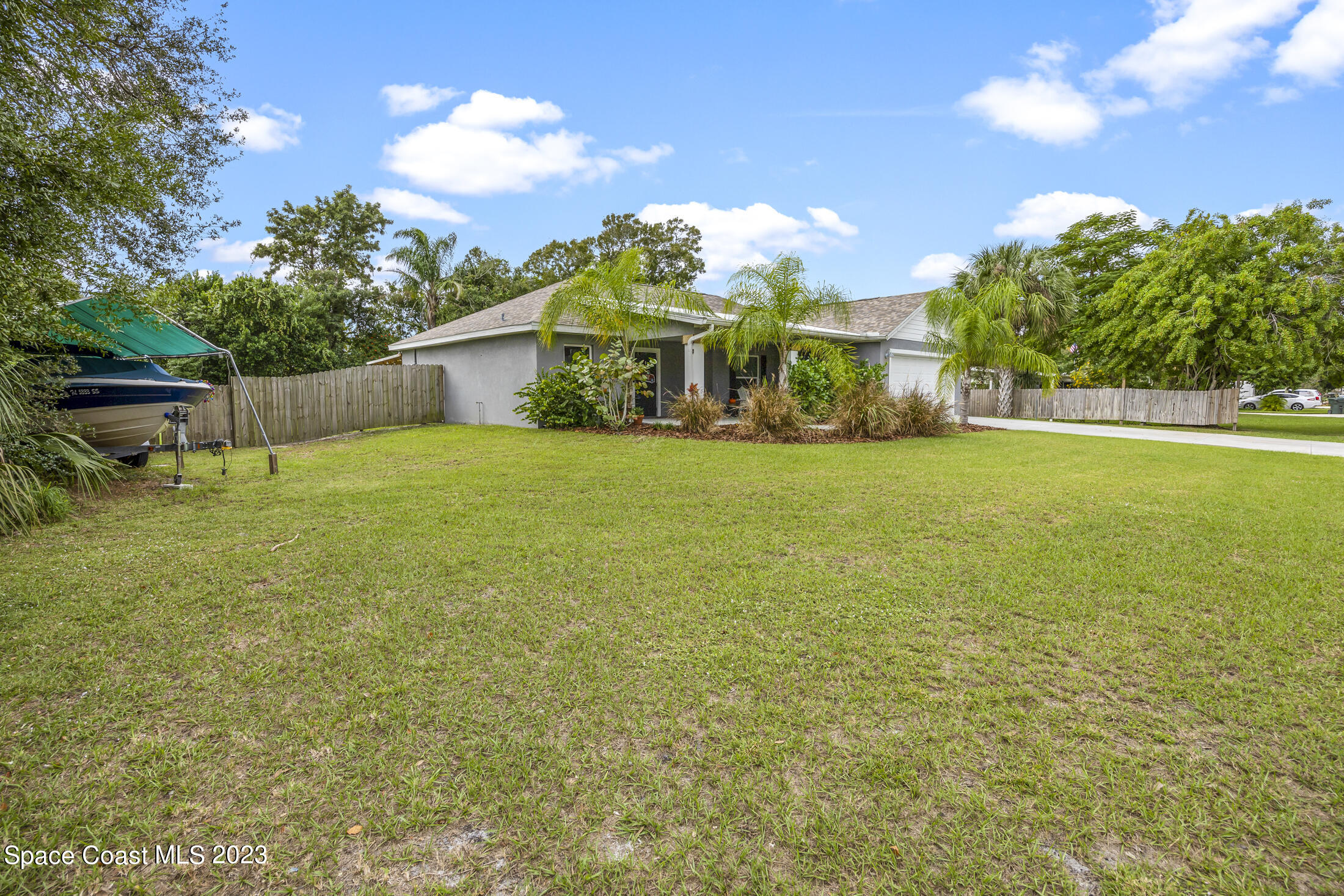 1003 Hayden Road Rockledge, FL 32955 - Photo 29 of 29 a view of a house with a yard and basketball court