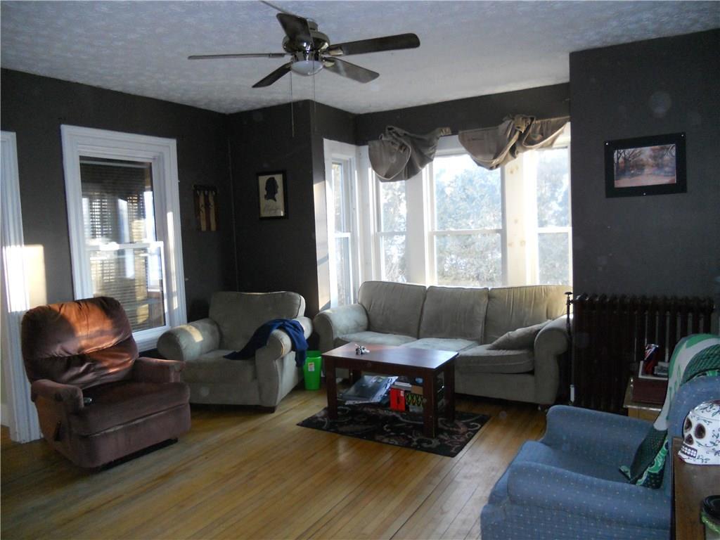 5 Maple Street Augusta, ME 04330 - Photo 7 of 32 Main unit Living room with oak...