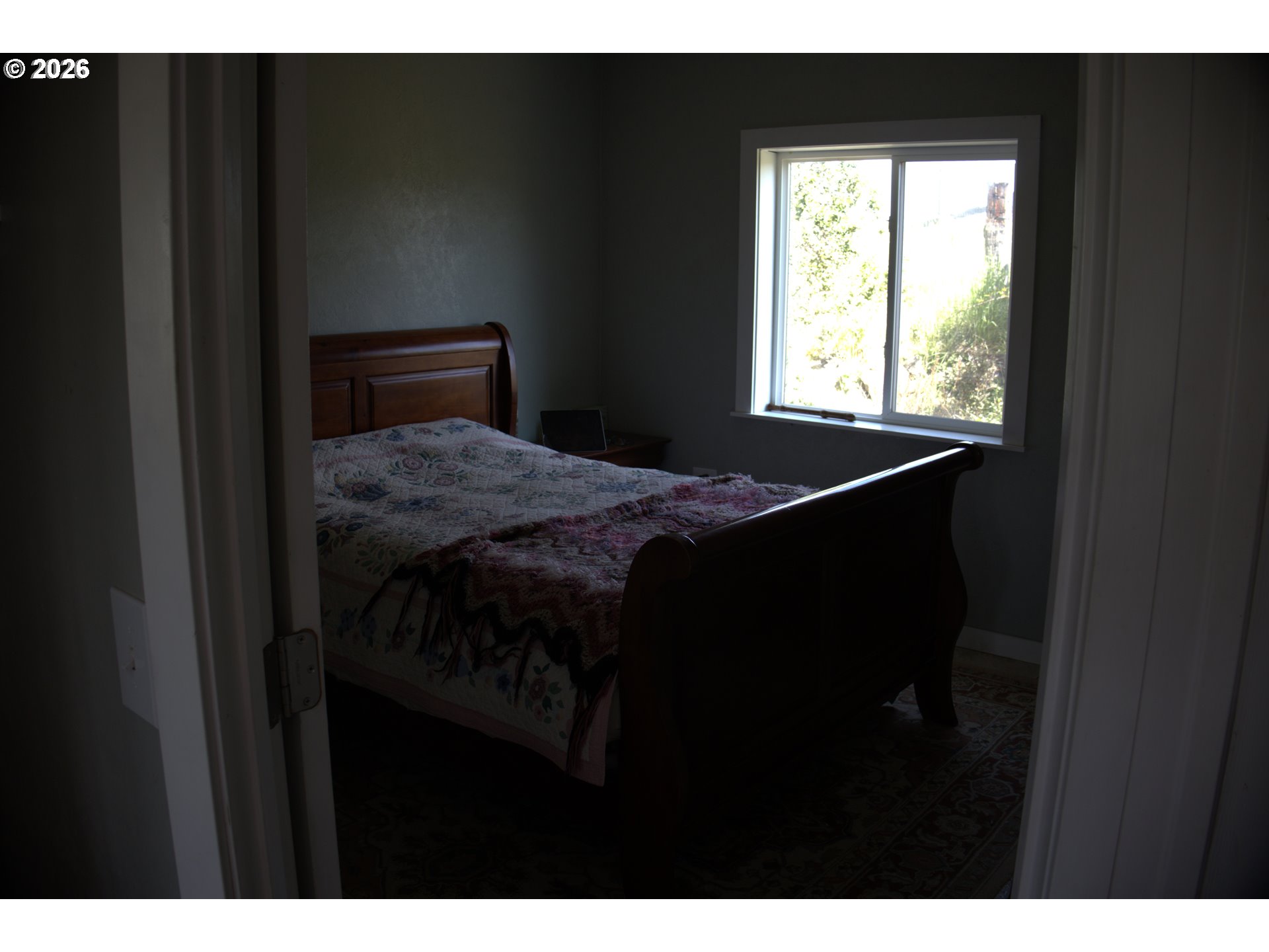 55821 Wildhorse Road Weston, OR 97886 - Photo 25 of 33 a bedroom with a bed and a window
