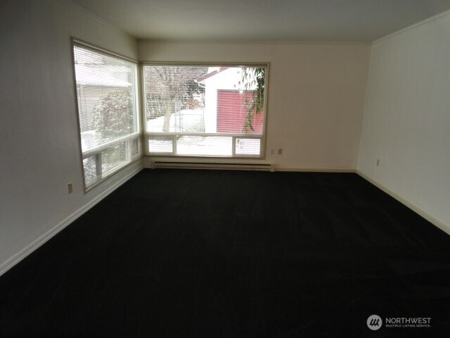 411 West 4th Street Aberdeen, WA 98520 - Photo 34 of 40 a view of an empty room with a window