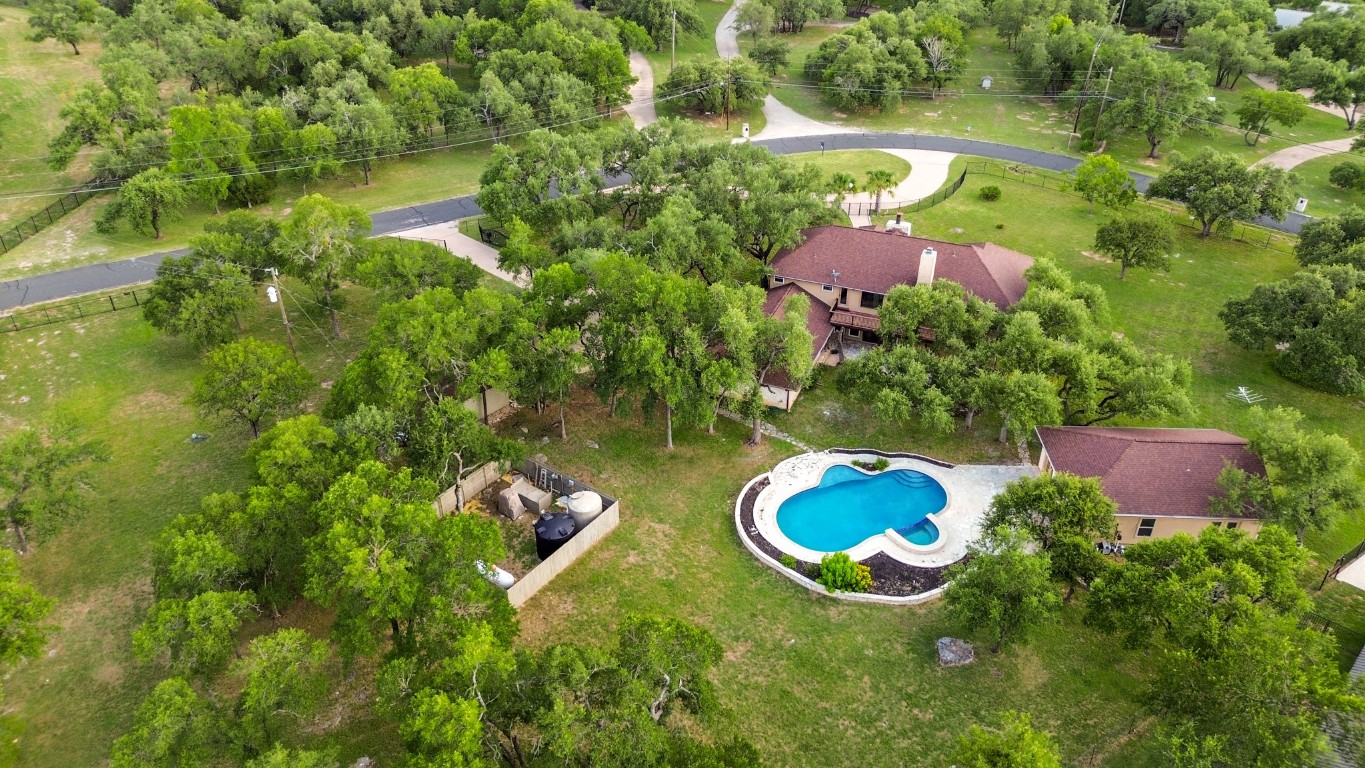 176 Logan Ranch Road Georgetown, TX 78628 - Photo 2 of 38 an aerial view of a house with yard swimming pool and outdoor seating