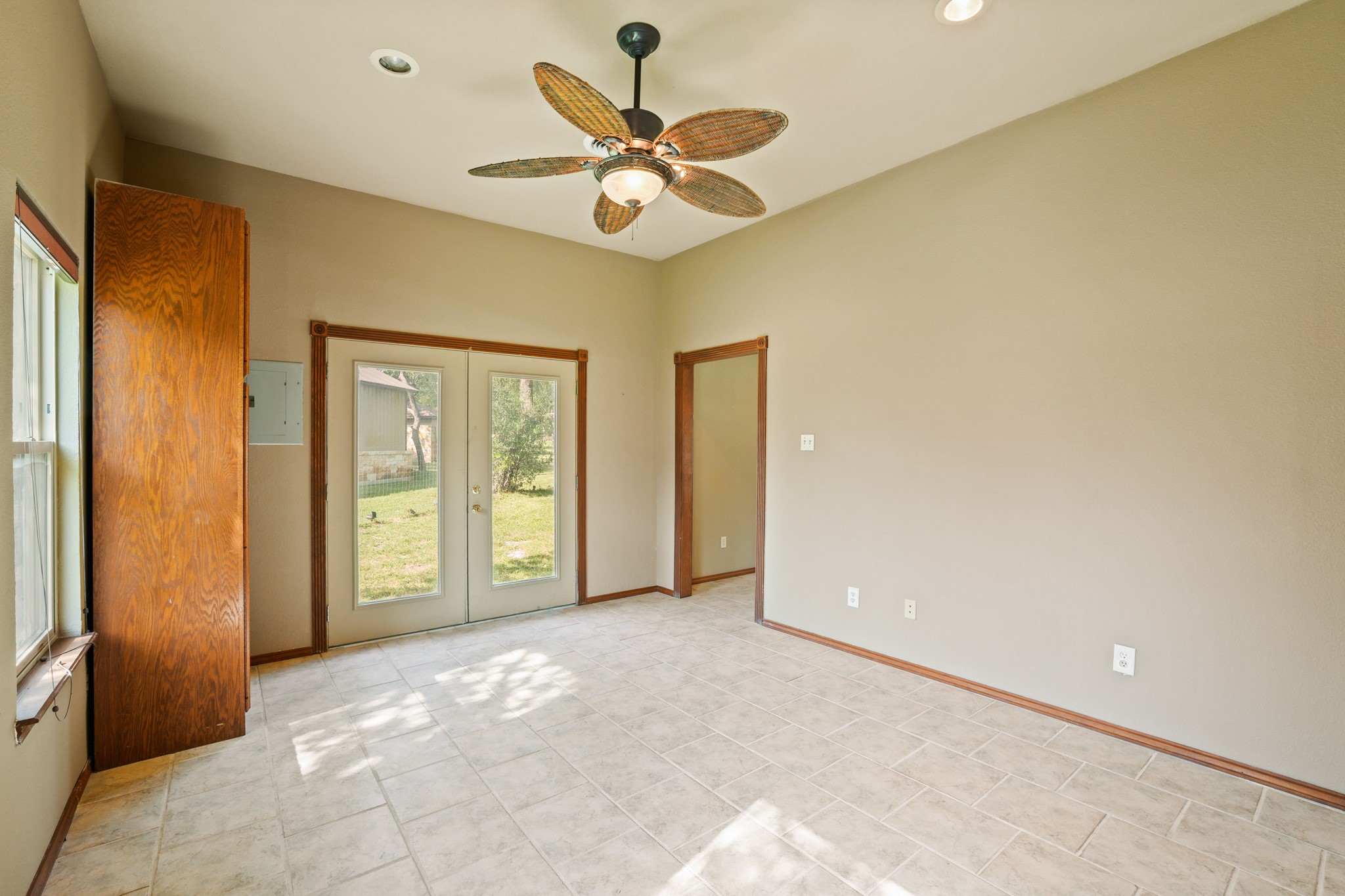 176 Logan Ranch Road Georgetown, TX 78628 - Photo 30 of 38 a view of a livingroom with a ceiling fan and a window