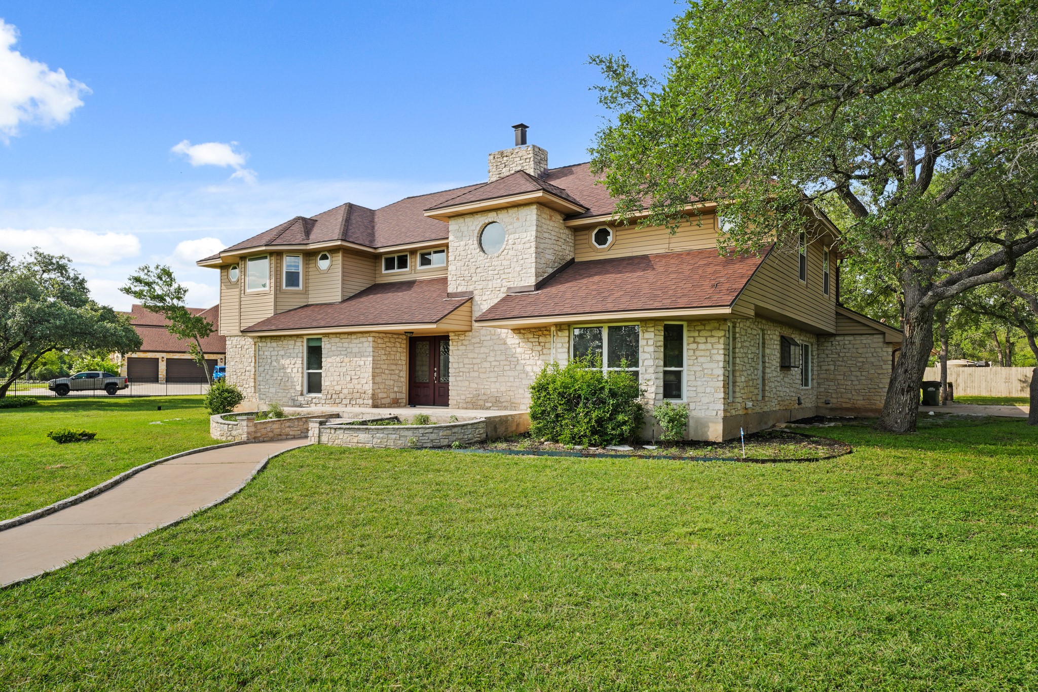 176 Logan Ranch Road Georgetown, TX 78628 - Photo 35 of 38 a front view of a house with a yard