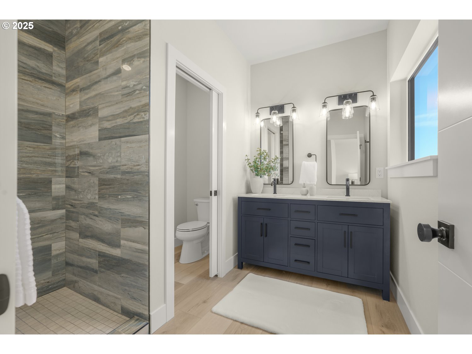 4165 Z Street Washougal, WA 98671 - Photo 33 of 40 a bathroom with a sink and a mirror