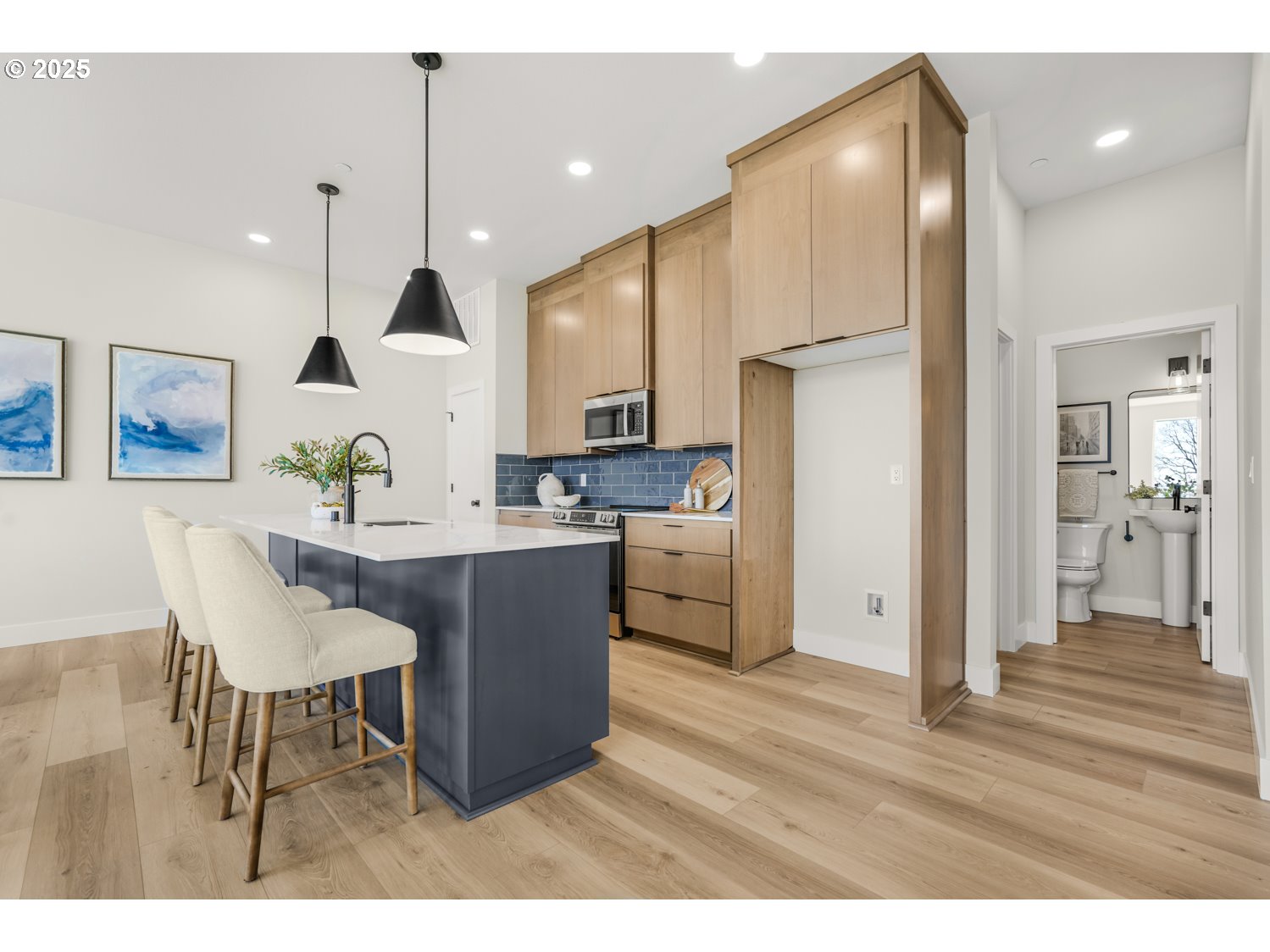 4165 Z Street Washougal, WA 98671 - Photo 5 of 40 a kitchen with stainless steel appliances kitchen island granite countertop a refrigerator and a sink